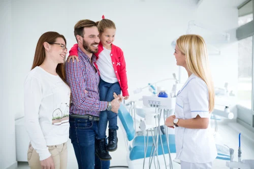 dad with child at dentist