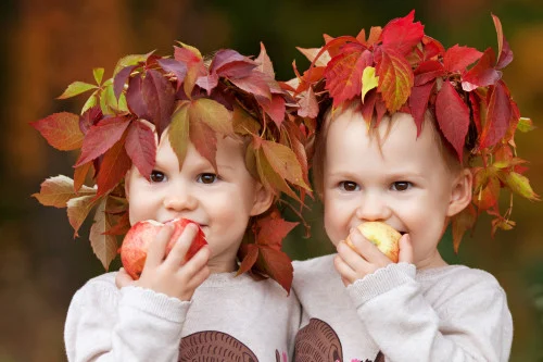 kids with fall leaves