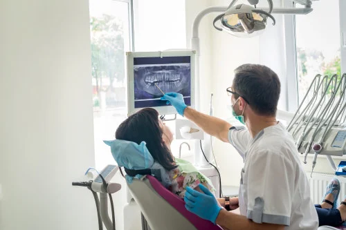 dentist explaining xrays to patient