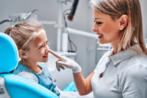 child in dentist chair