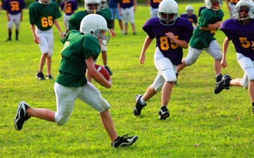 kids playing football