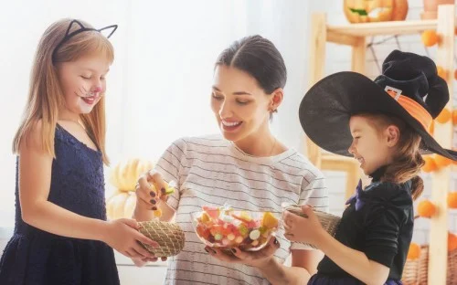 mom handing out candy