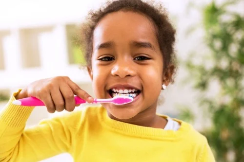 kid brushing teeth