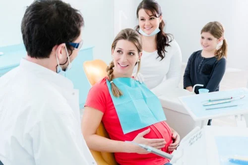 women pregnant in dental chair